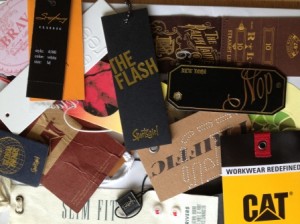 Garment and clothing hang tags and swingers