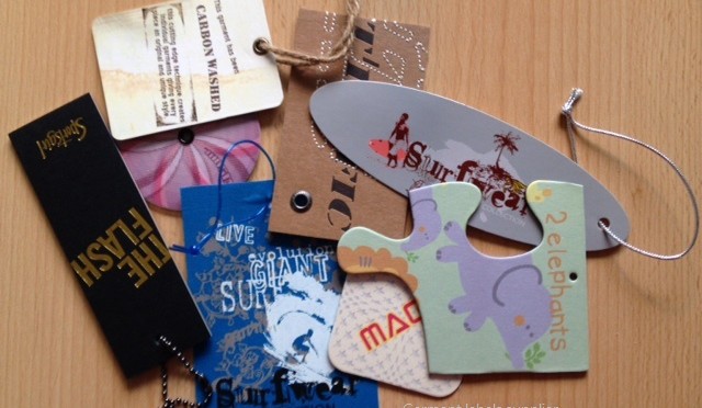 Product hang tags and swingers for clothing